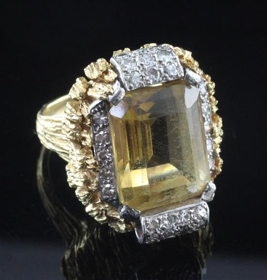 A 1970s? gold, citrine and diamond set dress ring, size P.